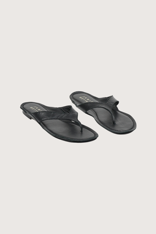 angled profile The San Diego Sandal Black Soft leather
, Opanka construction
Custom thin rubber sole
Italian lambskin leather
Thong strap style