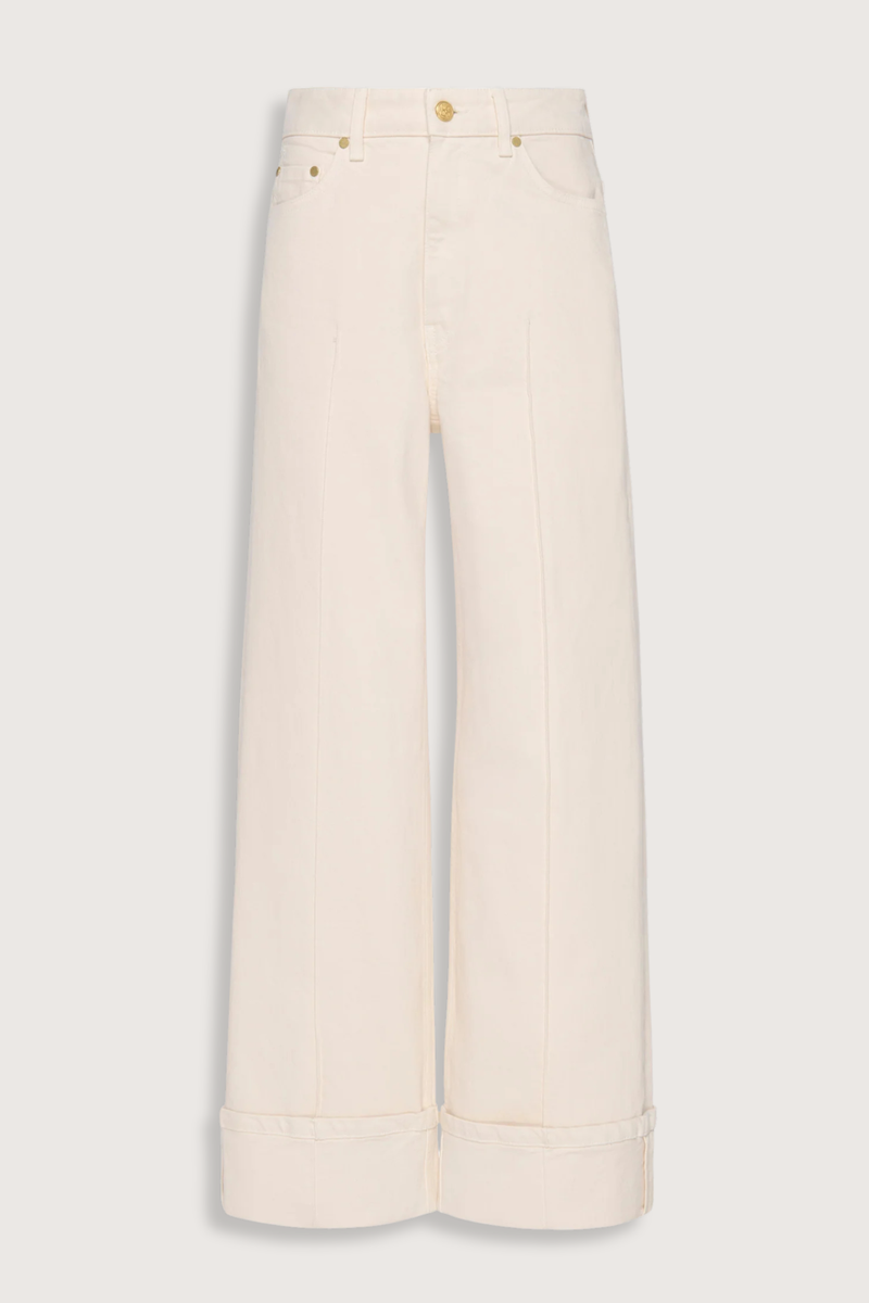 flat lay The Stretch Genevieve Jean Cowrie white Cowrie white denim
Seams down the center front
Exaggerated folded cuffs
Stretch denim
High-rise, wide leg