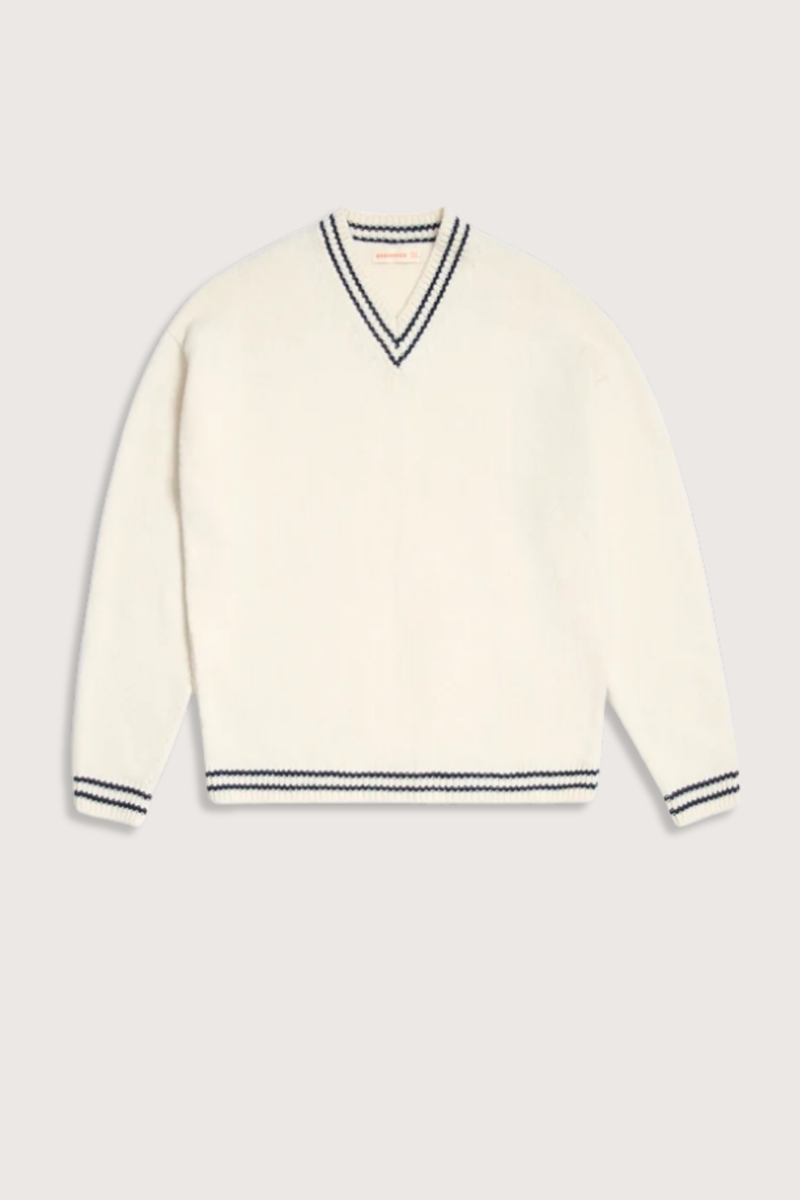 flat lay The Stripe Trim Balla V-Neck Sweater lambswool white with navy stripe detail on neck, hem and cuff 