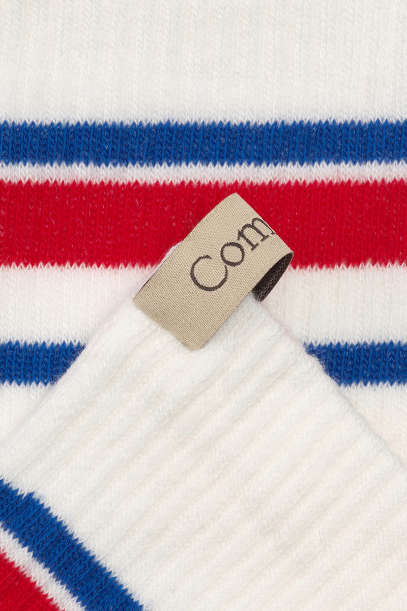 close up stripe and ribbon detail for The Tube Sock - Egyptian Cotton Blue/Cherry Bold stripes
Terry cushion footbed
Medium weight
Reinforced toe
decorative logo ribbon