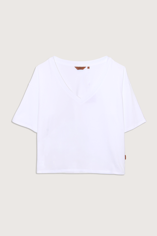flat lay The V Tee White Drop shoulder tee
Wide V-neck
Dolman shaped body
Lose shape
100% Cotton