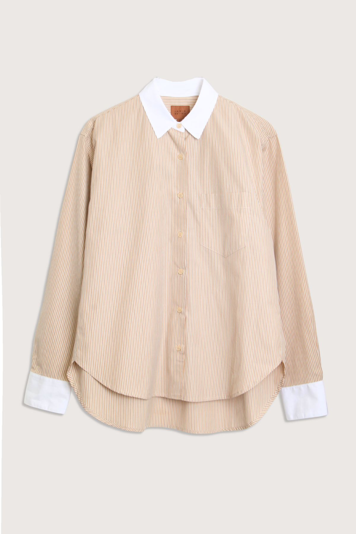 flat lay The Weekend Shirt honey cotton Menswear-inspired
Relaxed fit
Contrast white collar and cuffs
Curved hem
100% Japanese Cotton
