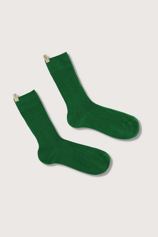 flat lay The Yves Sock Basil green Egyptian cotton wide rib with decorative logo ribbon tab