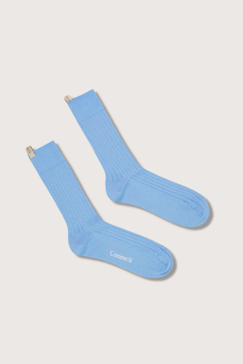 flat lay The Yves Sock Capri blue Egyptian cotton wide rib with decorative logo ribbon tab