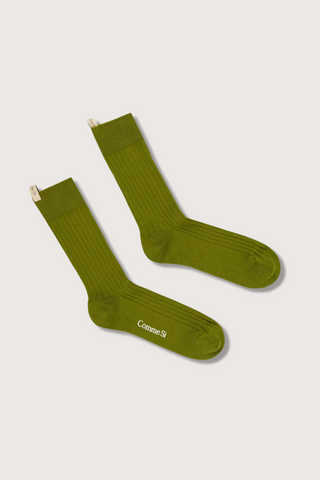 flat lay The Yves Sock Saguaro green Egyptian cotton wide rib with decorative logo ribbon tab