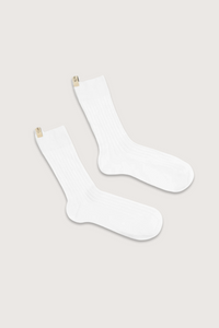 flat lay The Yves Sock White cotton ribbed with logo ribbon tab