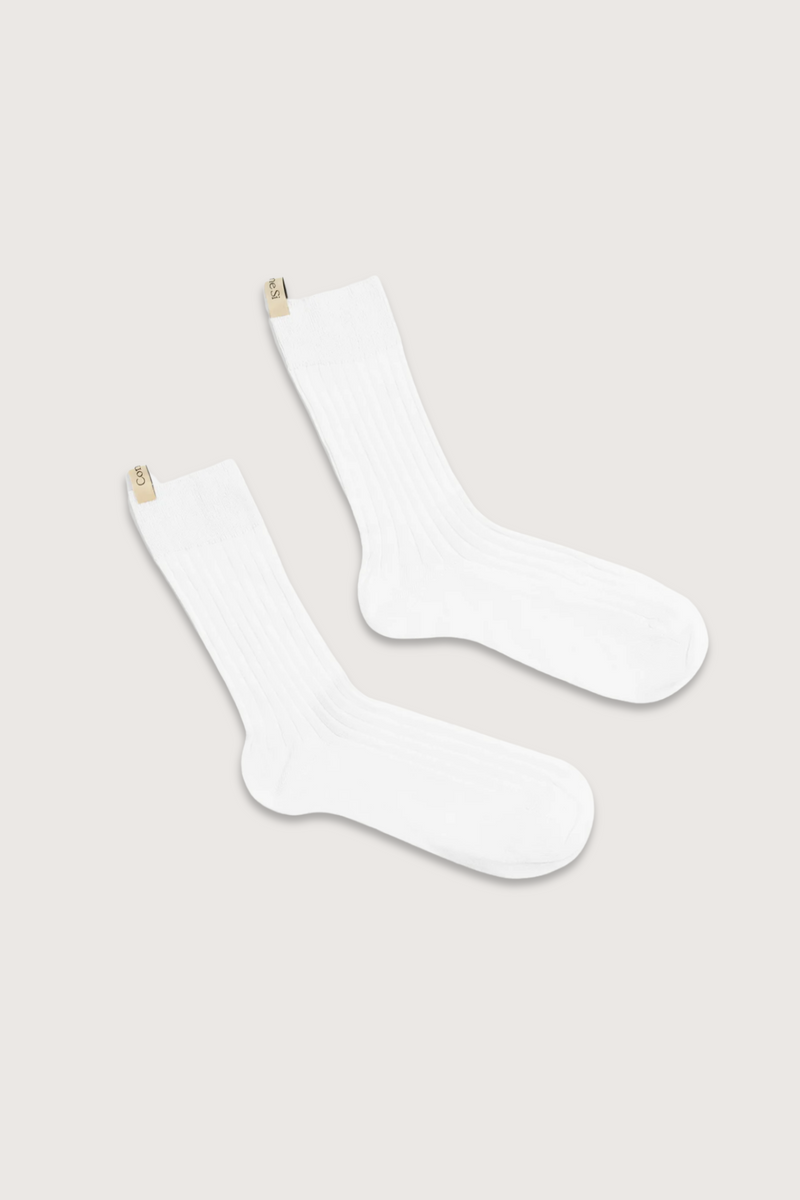 flat lay The Yves Sock White cotton ribbed with logo ribbon tab