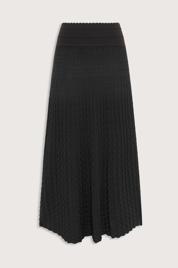 flat lay Thelma Skirt ebony deep black Two-tone
Pleated “arrow”-patterned knit
Mid-length cut
Wicker-style knit skirt
High waist
Wide scalloped waistband
50% viscose, 45% pure extra-soft virgin wool, 5% polyester
