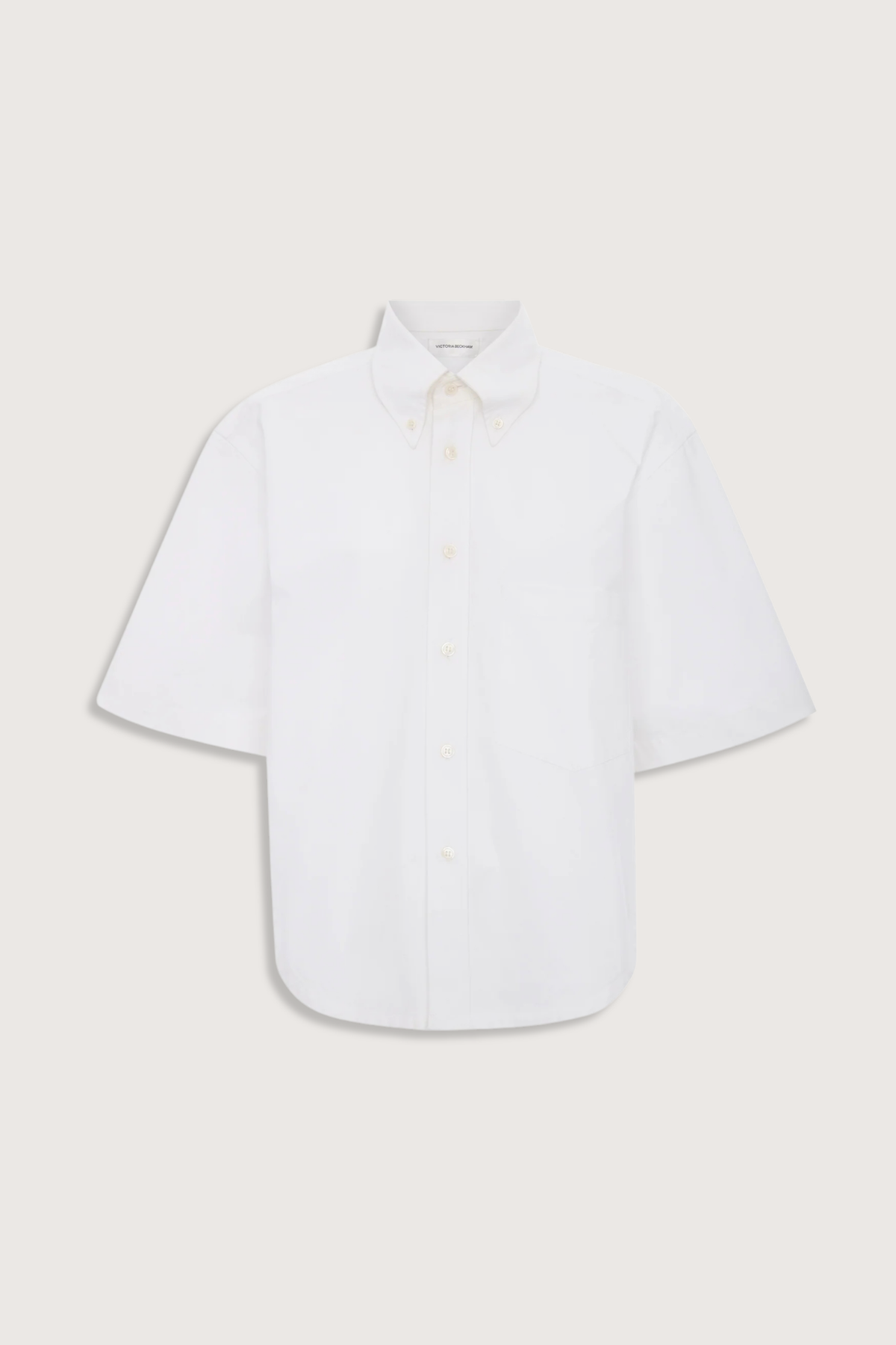 flat lay Trapeze Short Sleeve Shirt optical white Collared neckline
High hip length
Shirt sleeves
Covered back
Chest pocket
Front buttons
100% Cotton