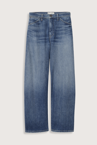 flat lay Tribeca Jean Classic Wash mid blue Mid-rise barrel leg
Japanese stretch denim
Curved silhouette
Front slant pockets
Coin pocket detail
Zip fly
Shank closure
Back patch pockets with topstitching
Belt loops