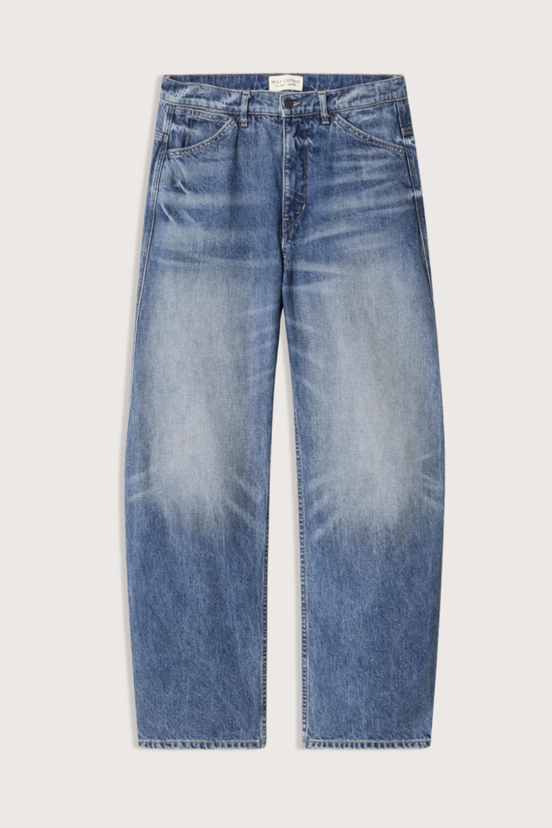 flat lay Tribeca Jean Rose Bowl mid wash blue cotton Mid-rise barrel leg
Japanese stretch denim
Curved silhouette
Front slant pockets
Coin pocket detail
Zip fly
Shank closure
Back patch pockets with topstitching
Belt loops