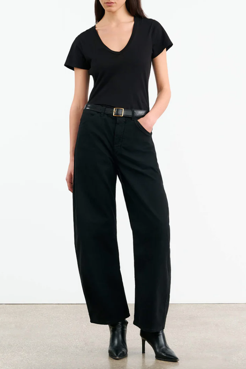 front profile model wearing Tribeca cotton Pant Military Jet Black barrel fit