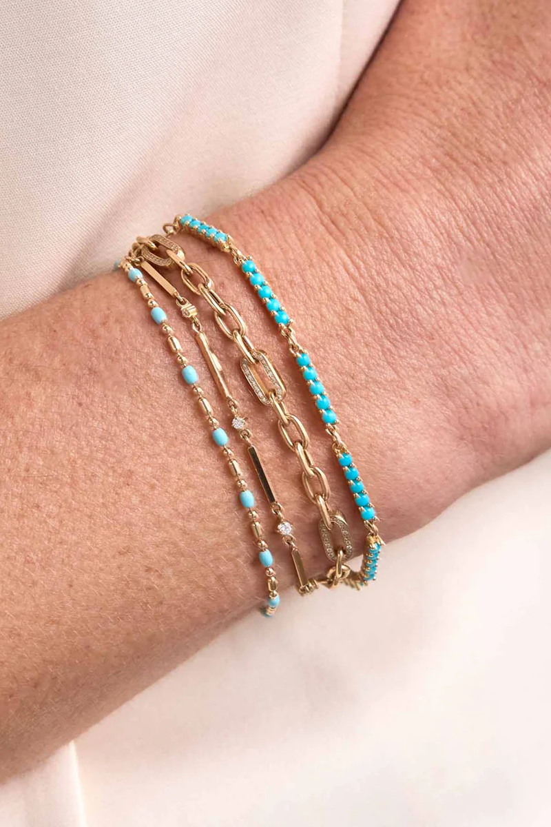 model wearing Turquoise Enamel Tube Bar Chain Bracelet 14k gold
