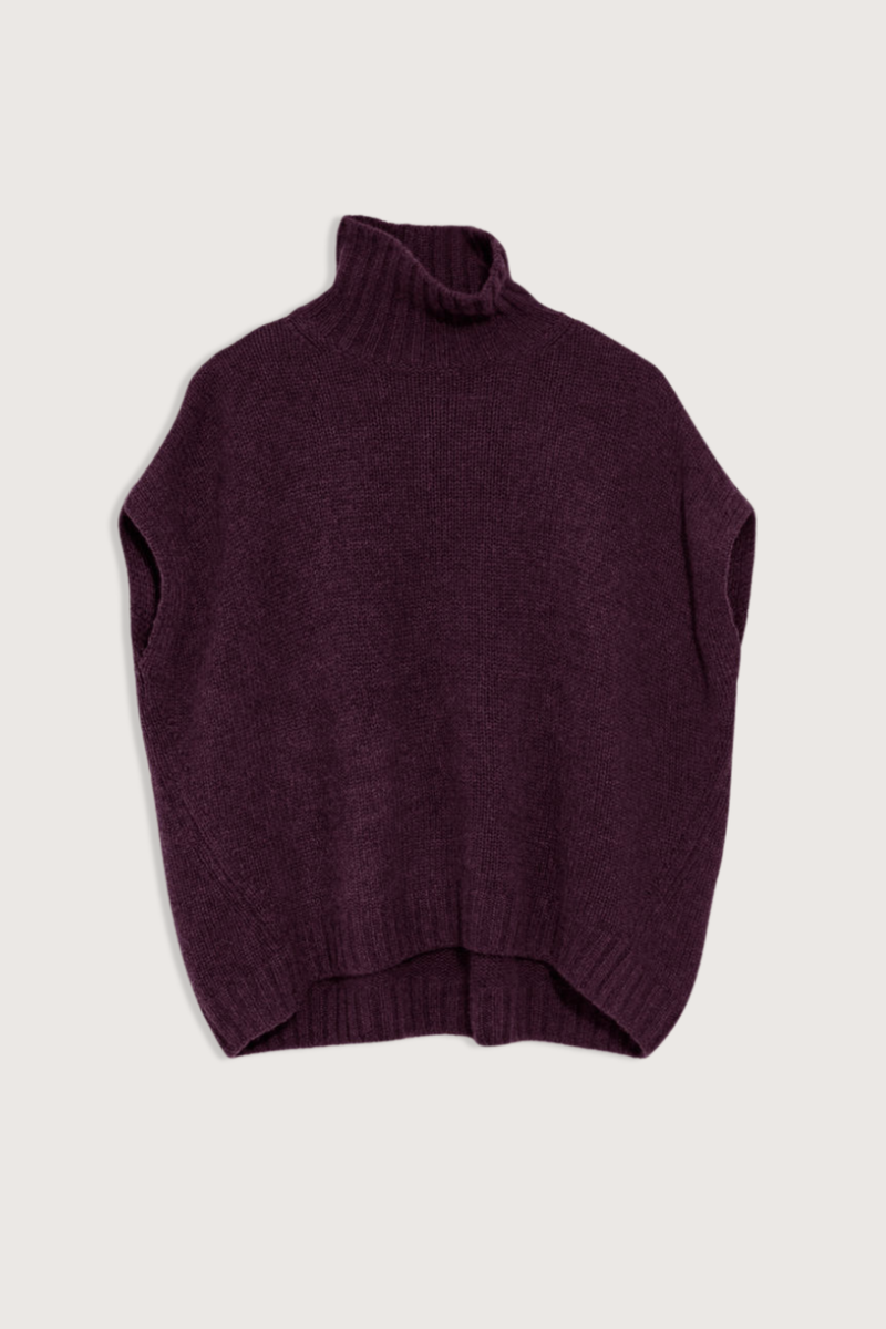 flat lay Turtle Neck Gilet Eggplant 100% Cashmere
Ribbed roll neck
Sleeveless
Falls slightly over shoulder
Falls below the waist
Loose fit
Rib trim hem