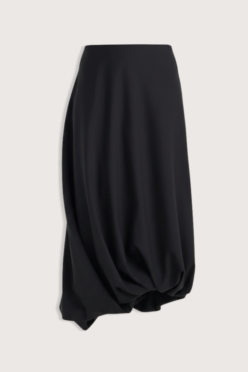flat lay Twisted Wool Skirt black Calf length skirt
Twist detail at the hem
Mid waist
73% virgin wool 27% wool mohair