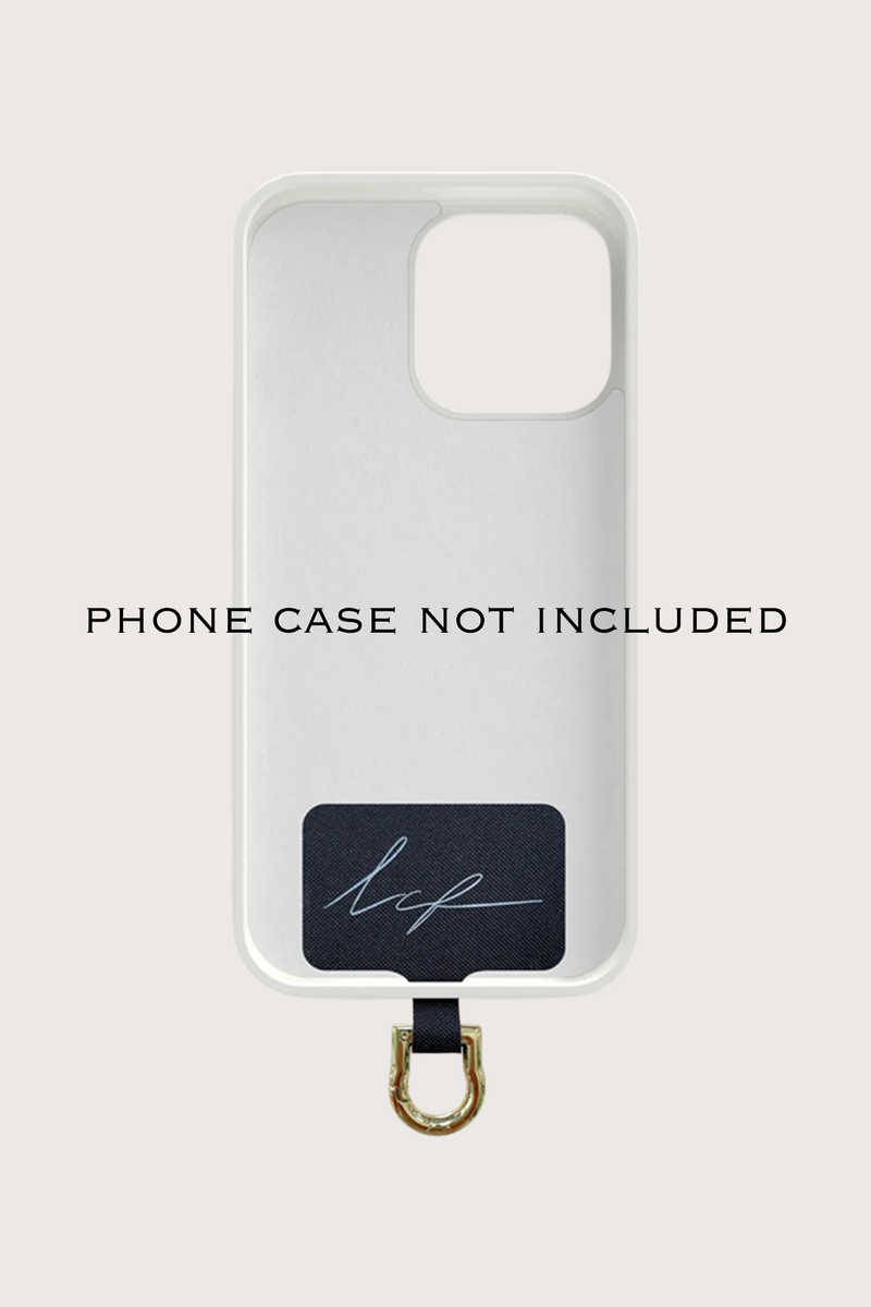universal adapter with phone case model demonstration Universal Adapter Dore Gold
Fits discreetly into your existing case
A removable carabiner protrudes slightly from the charging connector, making it easy to attach your chain
Made of black square branded fabric with a stainless steel coating