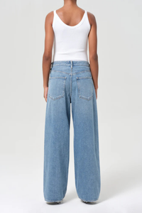 back profile model wearing Vana Fold Jean mantra light blue cotton Marbled vintage indigo wash
Fold-over detail at the waist
Classic five-pocket construction
Sculptural twist on a laid-back shape
Non stretch, weightless 100% cotton denim
Washed down for a super soft feel
Drapes effortlessly
Clean structure
