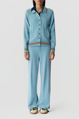 front profile model wearing Varsity Jacket Cotton/Cashmere clear sky blue MID-WEIGHT VARSITY JACKET
ATHLETIC STRIPE TAPE AT SLEEVE CENTER
STRIPED RIB HEM AND SLEEVE CUFF
FRONT POCKETS
FRONT BUTTON CLOSURE
RIB POLO COLLAR WITH CONTRAST COLOR TIPPING
RAGLAN ARMHOLE
BACK NECK GIR BRANDING