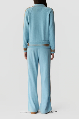 back profile model wearing Varsity Jacket Cotton/Cashmere clear sky blue MID-WEIGHT VARSITY JACKET
ATHLETIC STRIPE TAPE AT SLEEVE CENTER
STRIPED RIB HEM AND SLEEVE CUFF
FRONT POCKETS
FRONT BUTTON CLOSURE
RIB POLO COLLAR WITH CONTRAST COLOR TIPPING
RAGLAN ARMHOLE
BACK NECK GIR BRANDING