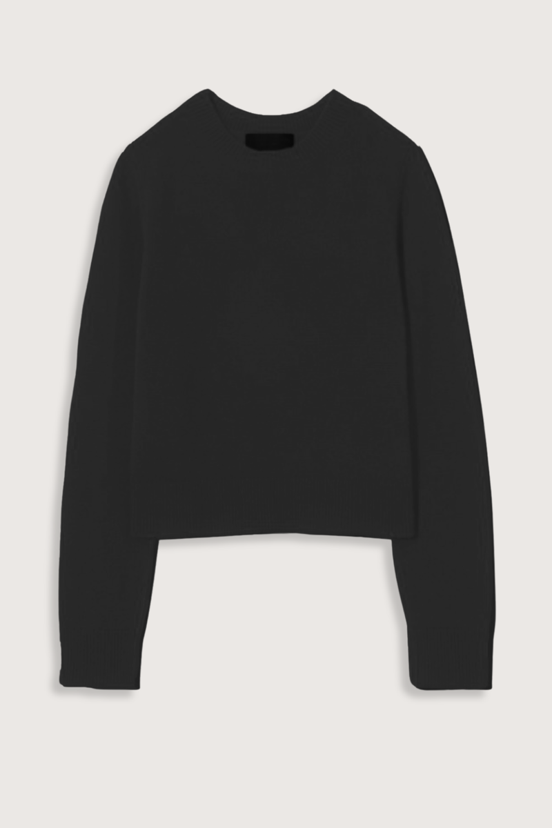 flat lay Venus Cashmere Sweater Black Light to medium weight gauge
Crewneck
Long sleeves
Fully fashioned along neck, sleeve and arm hole
Center back signature cableknit detail
Shorter body, not cropped
100% CASHMERE