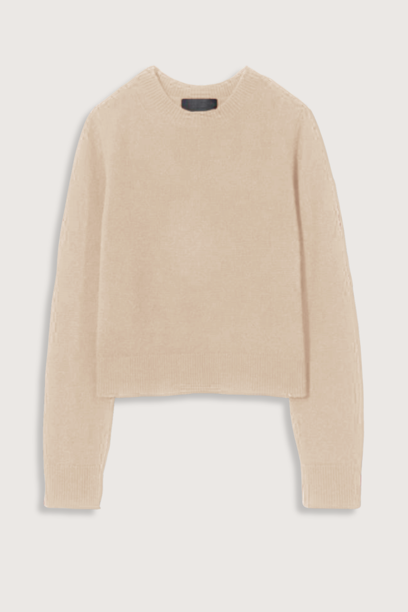 flat lay Venus Cashmere Sweater Taupe Light to medium weight gauge
Crewneck
Long sleeves
Fully fashioned along neck, sleeve and arm hole
Center back signature cableknit detail
Shorter body, not cropped
100% CASHMERE