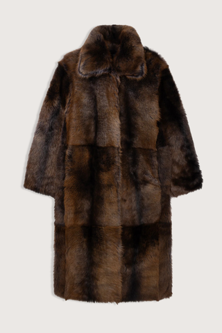flat lay Verena Toscana Long Coat night Shearling Coat
100% lamb leather with a rich Night finish
Long, voluminous silhouette
Regular fit
Unlined