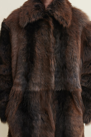 close up fur detail for  Verena Toscana Long Coat night Shearling Coat
100% lamb leather with a rich Night finish
Long, voluminous silhouette
Regular fit
Unlined