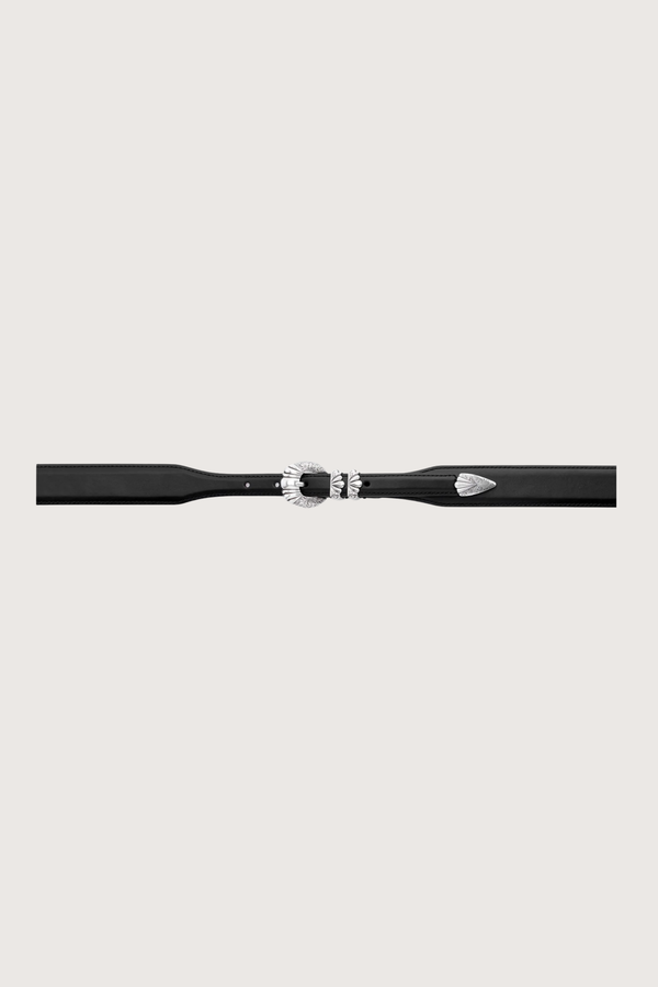 flat lay Versailles Black Calf Belt Hand-worked tapered silhouette, gradually shifting from 3.6 cm to 2 cm
4-piece “Versailles” buckle in an antique silver finish
100% calfskin
Solid brass hardware
Buckle: 2 cm
Height: 3.6 cm to 2 cm