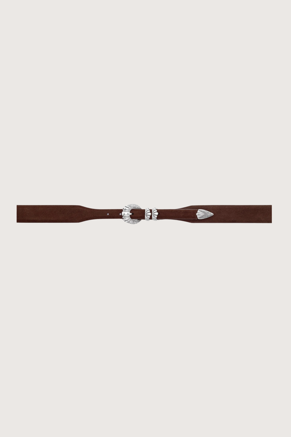 flat lay Versailles Brown Suede Belt Hand-worked tapered silhouette, gradually shifting from 3.6 cm to 2 cm
4-piece “Versailles” buckle in an antique silver finish
100% suede
Solid brass hardware
Buckle: 2 cm
Height: 3.6 cm to 2 cm