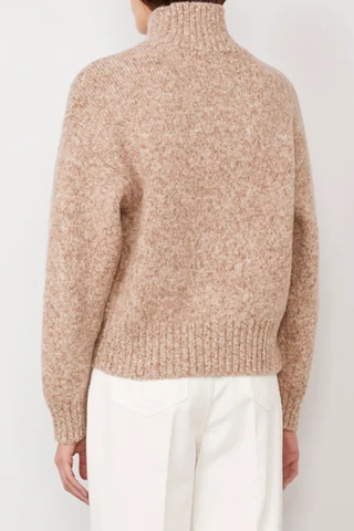 back profile model wearing Vesna Marl Fuzzy T-Neck Sweater beige cream Long-sleeve
Turtleneck
Dropped shoulders
Regular fit