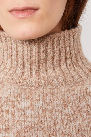 close up texture knit detail for Vesna Marl Fuzzy T-Neck Sweater beige cream Long-sleeve
Turtleneck
Dropped shoulders
Regular fit