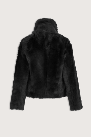 back flat lay Veste Reversible Fur Jacket Noir Unlined Toscana lambskin
Two piped pockets
Front hook-and-eye fastening
Draped collar
Long-haired lamb
Wide cut
100% Lamb
