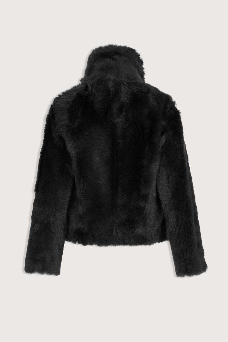 back flat lay Veste Reversible Fur Jacket Noir Unlined Toscana lambskin
Two piped pockets
Front hook-and-eye fastening
Draped collar
Long-haired lamb
Wide cut
100% Lamb