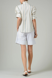 back profile model wearing Vita Stripe Short Sleeve Top yellow grey stripe Puff sleeves
Vertical stripe pattern
Ruched sleeves with thick cuffs
High collar with ruffles
Button front

Side slit
100% Cotton