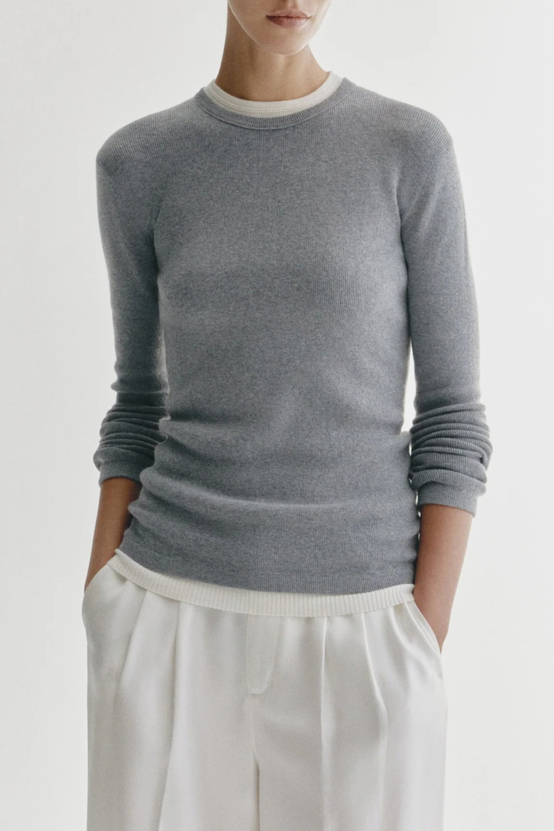 front profile model wearing Vivian Long Sleeve Ribbed T-Shirt Cloud grey Knitted long-sleeve T-shirt
Fine single rib knit cashmere blended with cotton
Fitted, hip-length silhouette
Round neck
Full-length sleeves
Straight hem
70% Cotton, 30% Cashmere