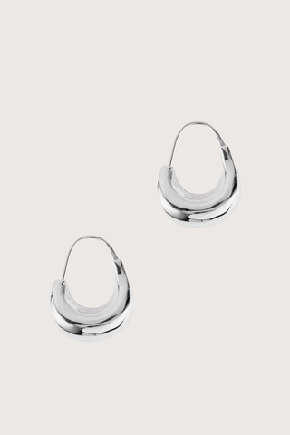 flat lay Wave Hoops Earring Rounded high-gloss wave shapes
Swing from the lobe
Rolling light around their bulbous forms
Sterling silver and plated in rhodium Earring
Length approximately 3.8cm