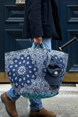 model wearing Weekend Bag Navy/Petrol cotton bandana with long and short handles