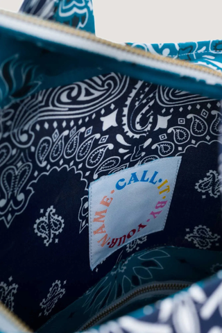 close up of inside logo Weekend Bag Navy/Petrol cotton bandana with long and short handles