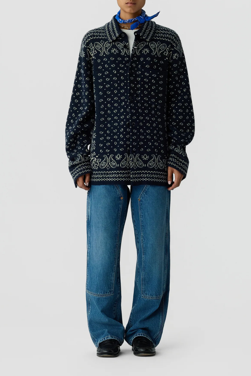front profile model wearing Wild Rag Work overshirt Midnight blue Unisex 
Knit from mid-weight 100% cashmere
Relaxed fit
Classic shirt collar
Bandana print throughout
Chest patch pocket
Front button down closure
Button sleeve cuff with placket