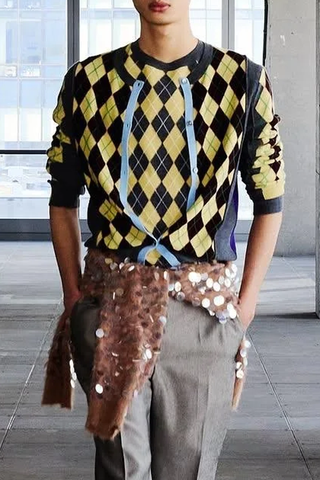 model wearing  William Argyle Cardigan wool long sleeve crewneck