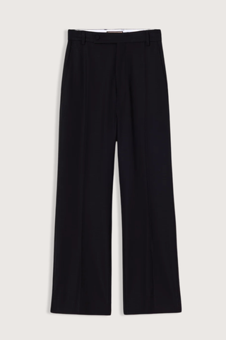 flat lay Wool Trouser black Classic tailored
Straight-leg
Mid-to-high waistband
Belt loops
Extended asymmetric front button fastening
Side slip pockets
Crisp central front crease.
97% Virgin Wool 3% Elastam | LINING: 62% Cupro 38% Cotton