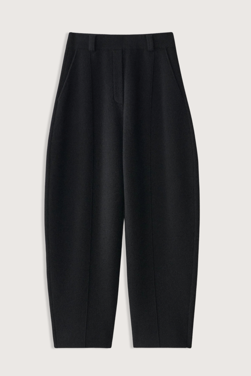 flat lay Wrenda Cashmere Barrel Trousers black tailoring-inspired
Structure and shape
Double face cashmere
Relaxed fit
Mid waist into full-length
Wide barrel legs
Belt loops
Faux fly
Reverse stitch pin tucks
Side seam pockets
100% Cashmere