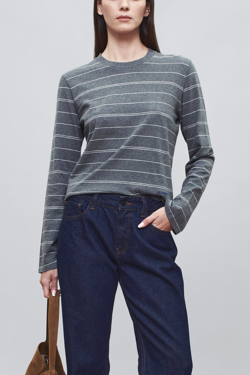 front profile model wearing Wynn Long Sleeve Stripe T-Shirt Heather Grey Long sleeve t-shirt
Relaxed boxy fit
Subtle cropped length
Custom drawn stripe
Roomy sleeves
Slight taper at waist