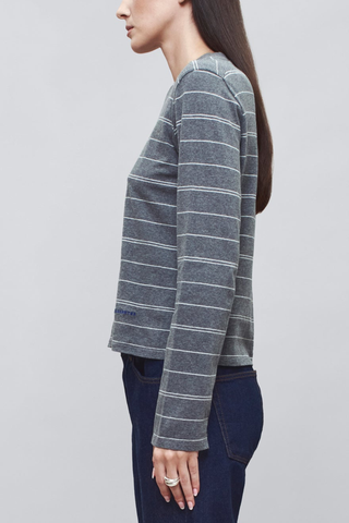 side profile model wearing Wynn Long Sleeve Stripe T-Shirt Heather Grey Long sleeve t-shirt
Relaxed boxy fit
Subtle cropped length
Custom drawn stripe
Roomy sleeves
Slight taper at waist