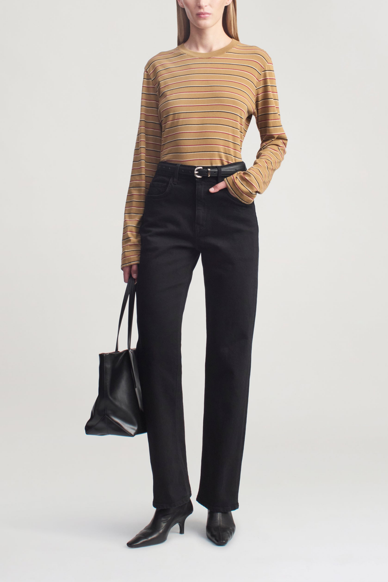 front profile model wearing Wynn Long Sleeve Stripe Tee Camel Stripe Long sleeve t-shirt
Relaxed boxy fit
Subtle cropped length
Custom drawn stripe
Roomy sleeves
Slight taper at waist
Unisex
Shifted side seams give a tailored look
Solid binding at neckline
Subtle tonal logo embroidery at hip
100% Cotton