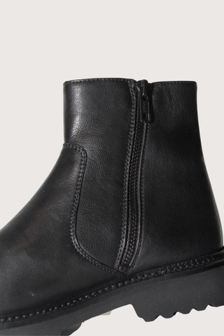 close up zipper detail for Zipper Boot Washed Leather black Washed leather
Side zip
Lightweight rubber lug soles
100% leather
Lining: 100% leather
100% leather insole
Rubber sole
Round toe
