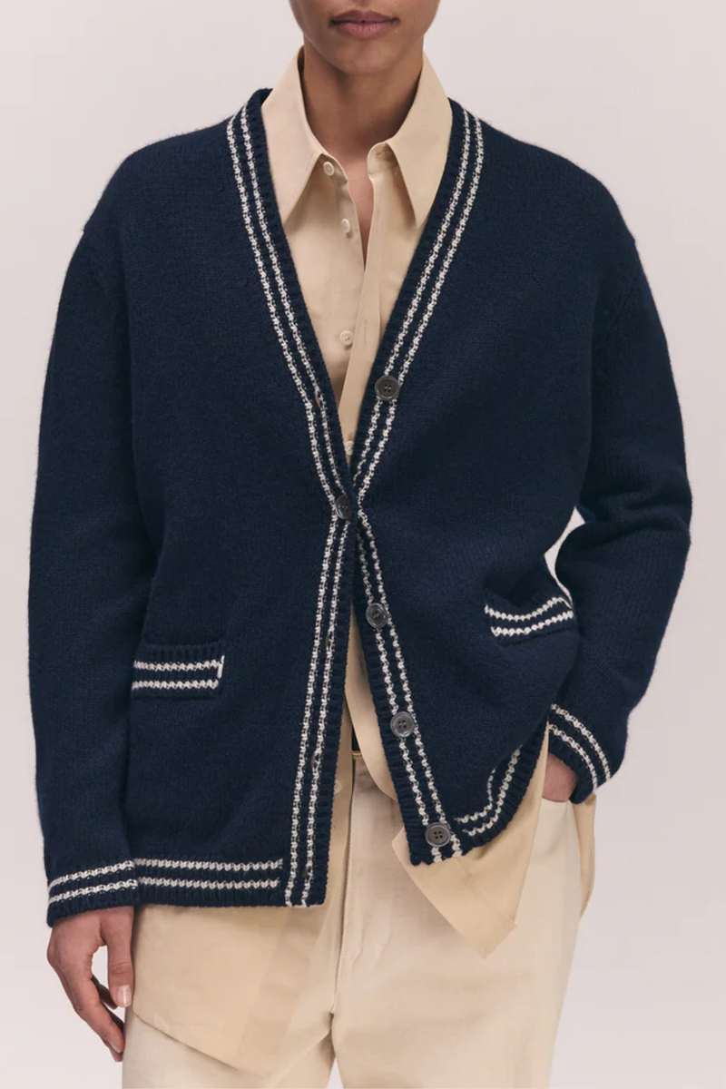 front profile model wearing The Stripe Trim V-Neck Cardigan navy white lambswool  White with Navy Stripe Trim
slouchy, oversized fit, v-neck, long sleeve