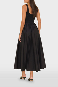 back profile model wearing Florence Tank Smock Dress black cotton Crisp paper poplin
Sleeveless midi sundress
Square neck
Smocked bodice
Side seam pockets