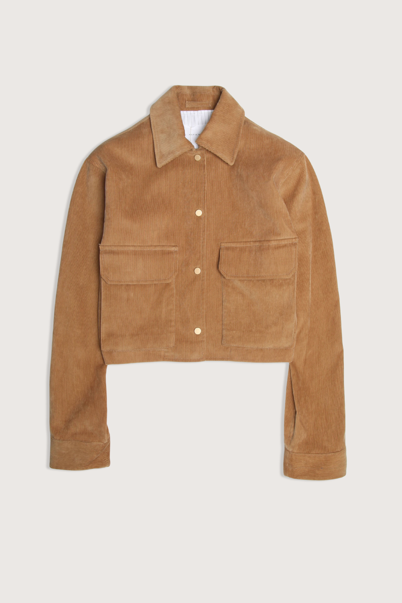 flat lay Cropped A-Line Cord Jacket caramel Two-way entry patch flap pockets at the front
Gently flared swing hem
Fastened with brushed German gold snaps
100% organic cotton Japanese corduroy